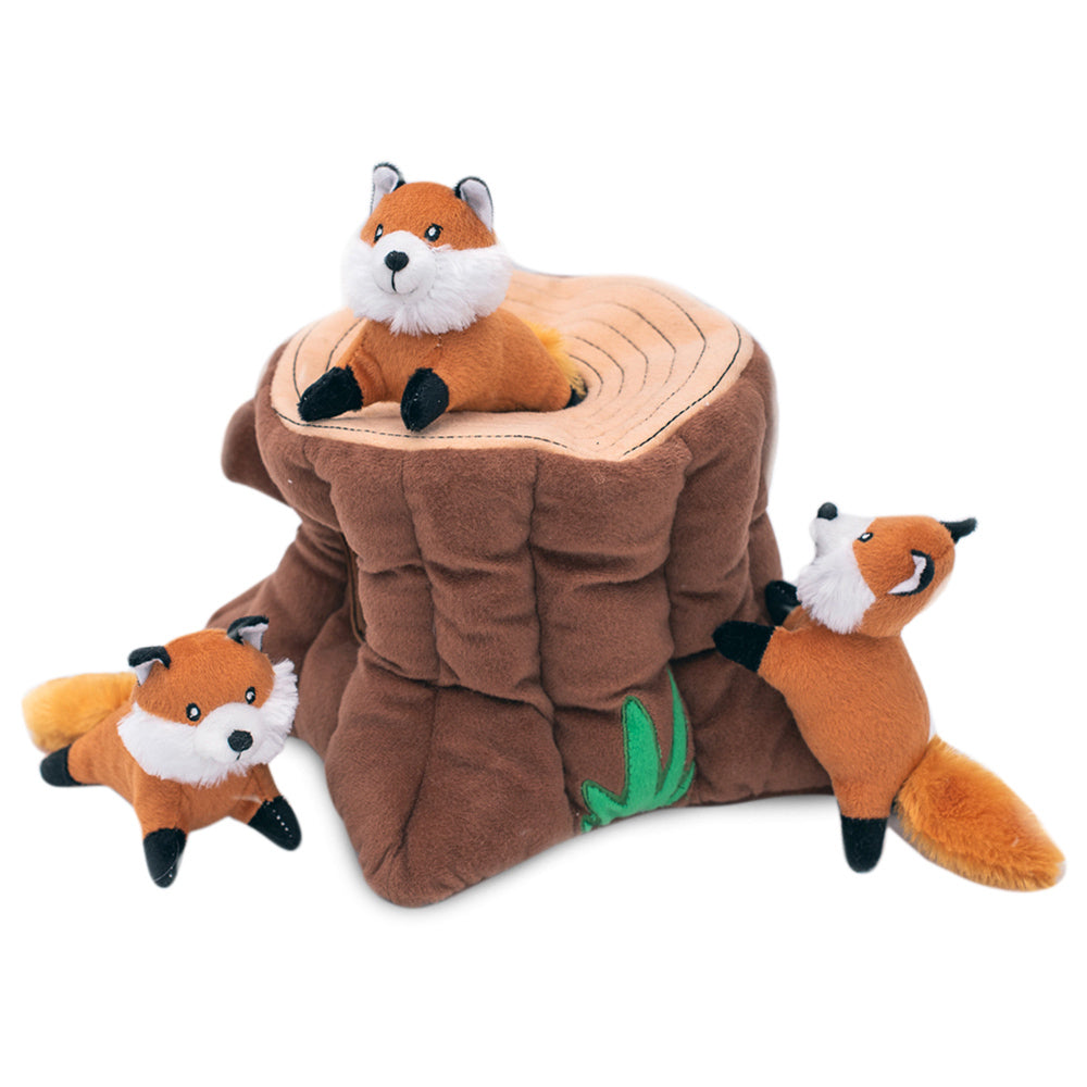 Zippy Paws Burrow fox stump dog toy with three plush foxes