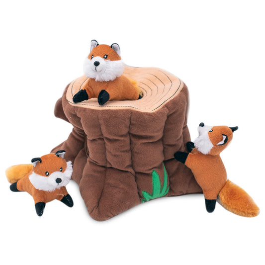 Zippy Paws Burrow fox stump dog toy with three plush foxes